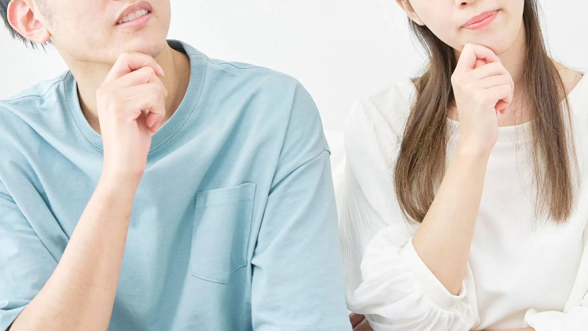 悩む男女