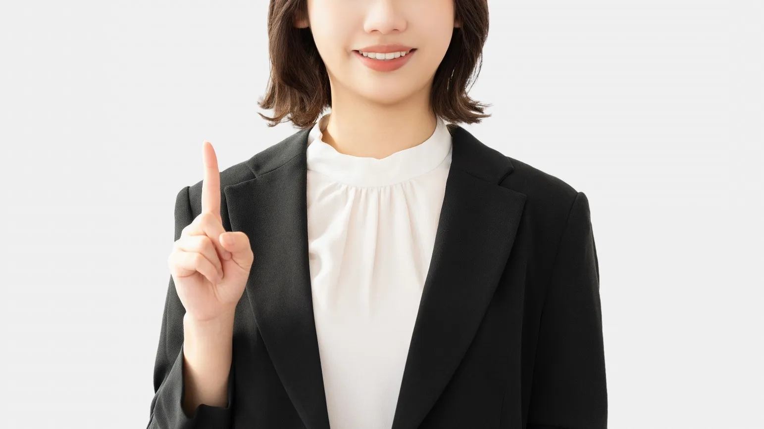 指さしする女性